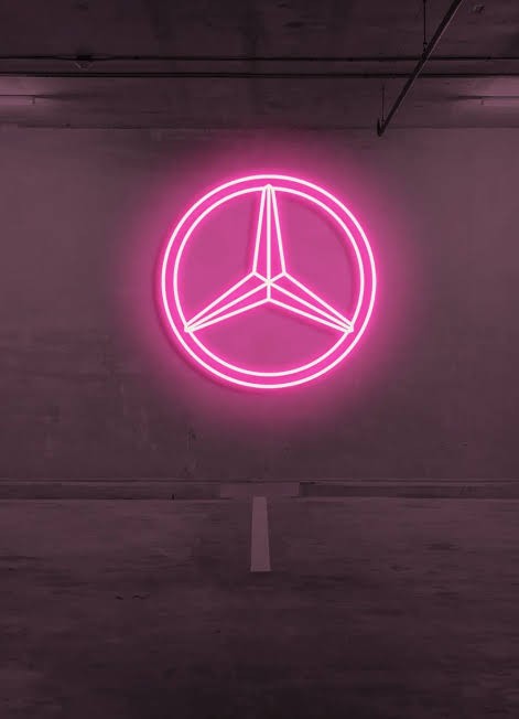 LOGO SIMBOLO MERCEDES NEON ROSADO